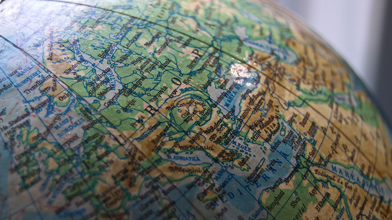 Antique globe of earth focused on Europa