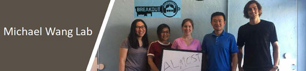 Members of Wang Lab pose with Dr. Wang at Breakout KC