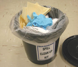 Trash bag lined 5-gallon bucket with all used clean-up materials inside